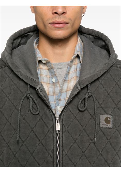 hooded vista quilted sweat jacket man black dyed CARHARTT WIP | I03566589.GD
